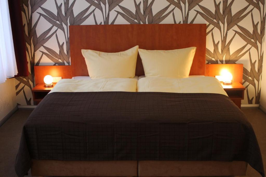 Hotel Schwarzer Adler Jever Rum bild